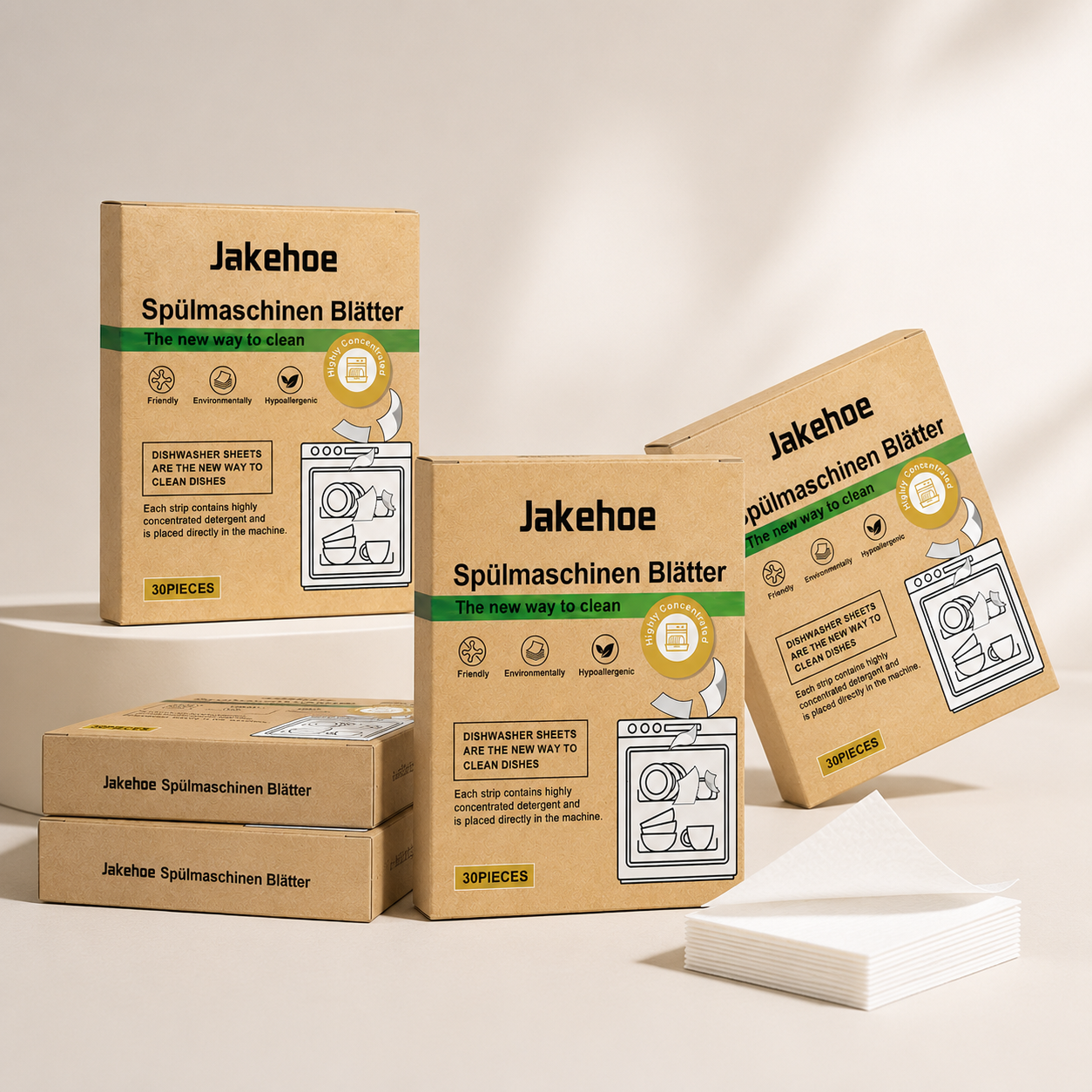 Studio product photoshoot of multiple Jakehoe dishwasher sheet boxes with detergent sheets arranged in a premium editorial setup.